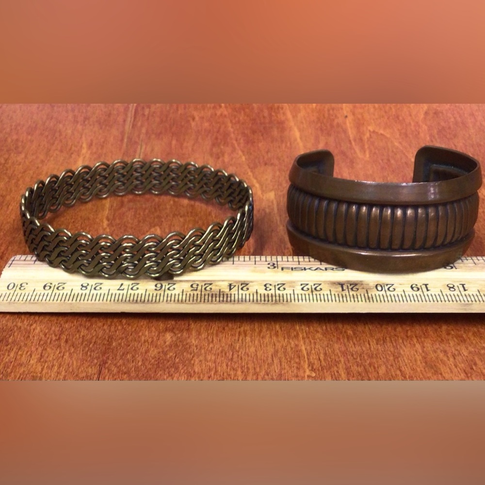 Pair of copper bracelets.